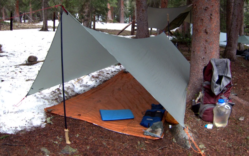 camping tarp under the tent
